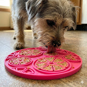 Citrus Suction Lick Mat — Pink Citrus mat shown in use.