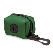 Clover Clip-On Bag Holder — Supplier photograph showing the bag holder dispensing opening and leash clip.