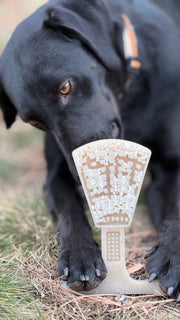 Waffle Tower Nylon Chew Toy — Waffle Tower nylon toy shown in use with a filling; food is not included.