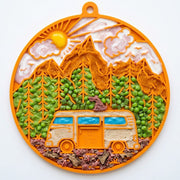 Camp Suction Lick Mat — Orange Camp mat shown with a food serving; food is not included.